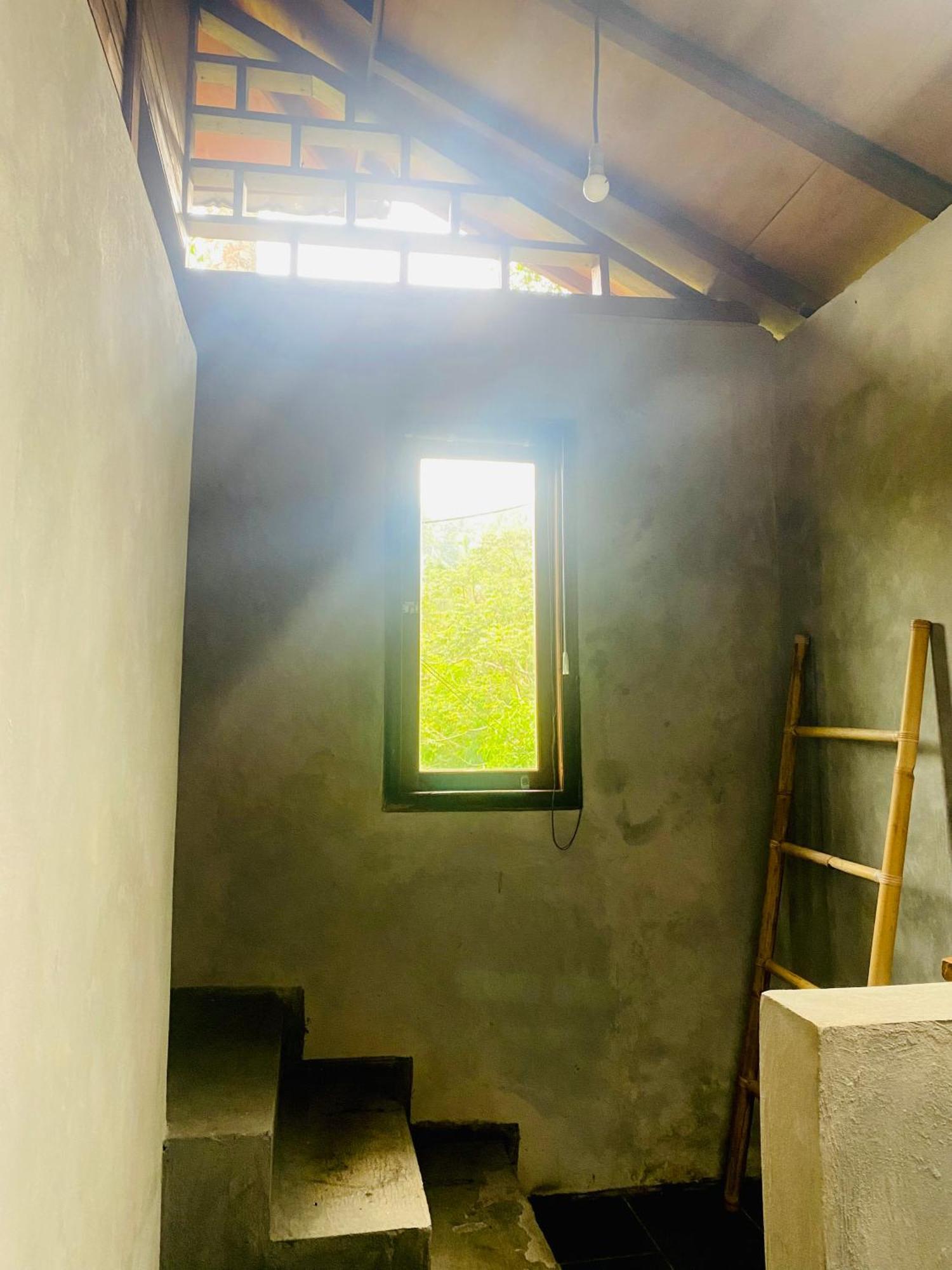 Uma D'Nyuh Homestay Singaraja Esterno foto