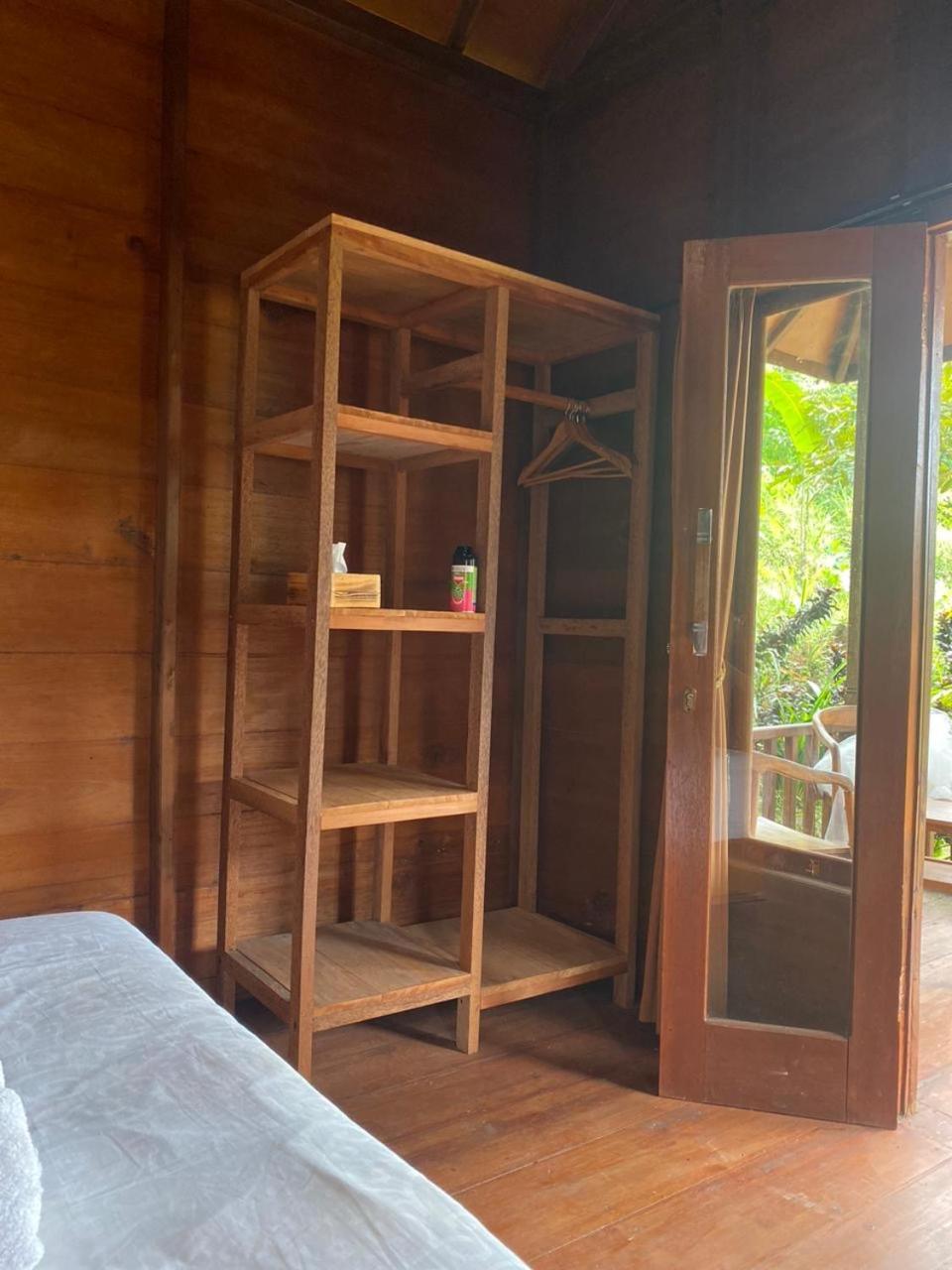 Uma D'Nyuh Homestay Singaraja Esterno foto