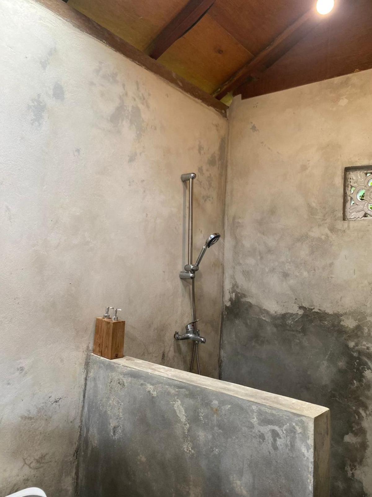 Uma D'Nyuh Homestay Singaraja Esterno foto